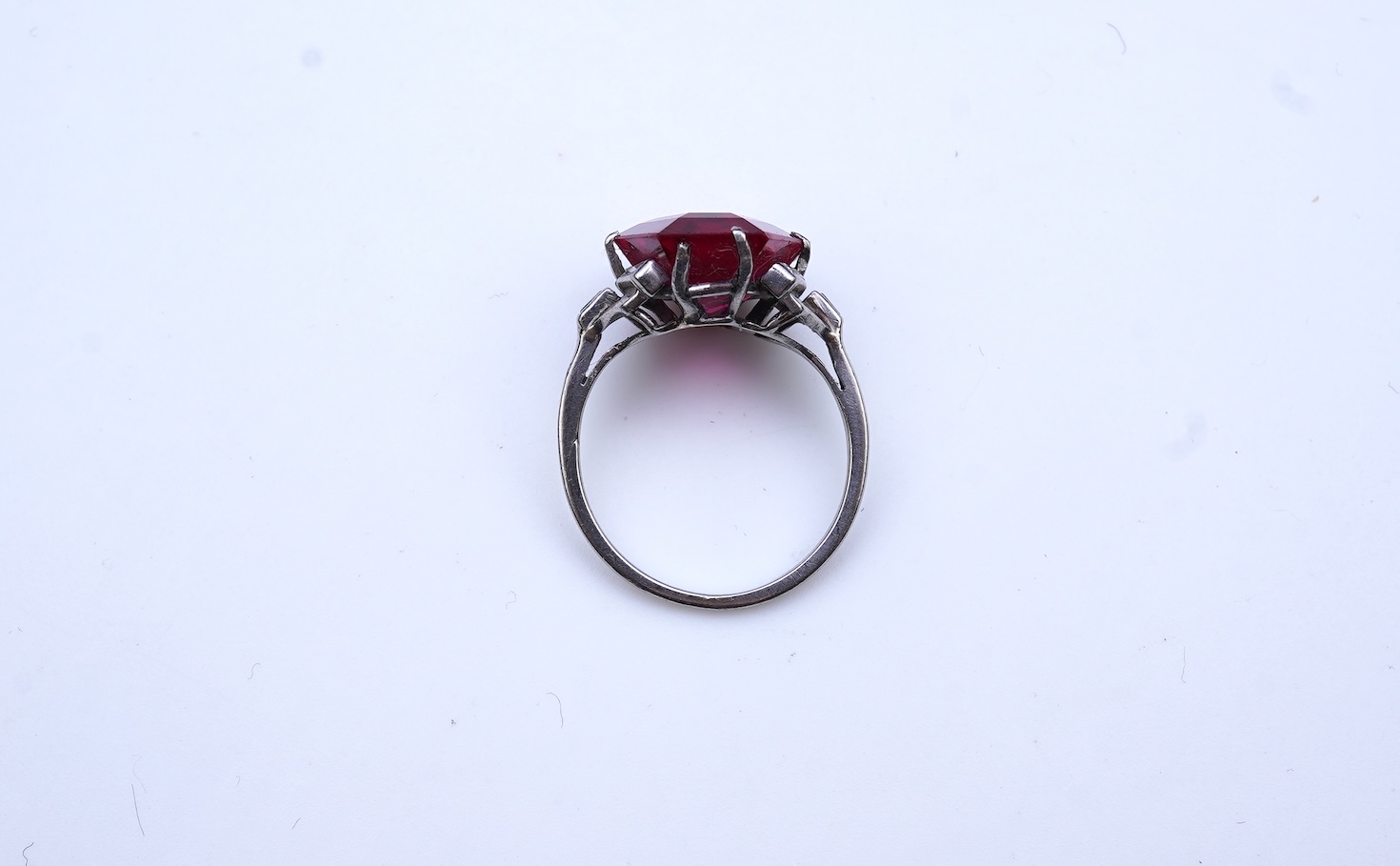 A synthetic ruby and diamond ring